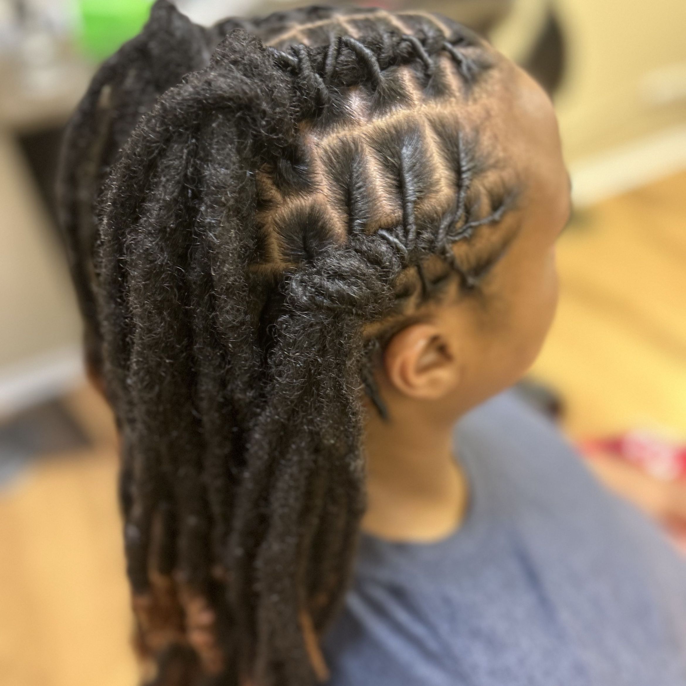Loc retwist and clean sectioning by Stephanie Styles at Crown Solutions